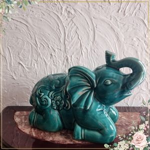 Benzara Adorable Ceramic Elephant in Turquoise